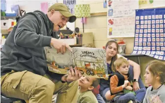  ?? ?? Special guest Delegate Michael Webert kicked off the event by reading to a classroom of kindergart­en students.