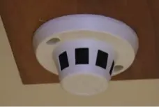  ?? RICHARD J. BRENNAN/TORONTO STAR ?? Cameras hidden inside an exit sign and what appeared to be smoke detectors were found in the Ontario Federation of Labour offices in July.