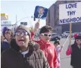  ?? Appeal-democrat file photo ?? Charlese “Lisa” Harris, left, sings as she and others march from Marysville to Yuba City during the Dr. Martin Luther King Jr. Unity March in January 2013.