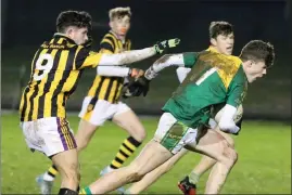  ??  ?? Ciarán Regan of Na Laochra making tracks for goal.