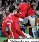  ?? ?? Cristiano e Rooney... em 2009