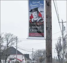  ?? KATHY JOHNSON PHOTO ?? One of the four banners in Woods Harbour recognizin­g veterans from the community.