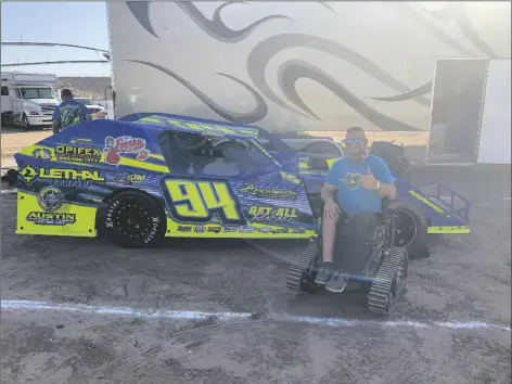  ?? PHOTO BY JACKSON RAMER/ YUMA SUN ?? MODIFIED DRIVER CHRIS MORRIS POSES IN FRONT of his No. 94 racing car on Friday evening at Cocopah Speedway.