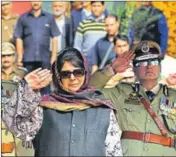  ??  ?? Jammu and Kashmir chief minister Mehbooba Mufti taking salute during a ceremony to mark the Police Commemorat­ion Day in Srinagar on Friday. WASEEM ANDRABI/HT