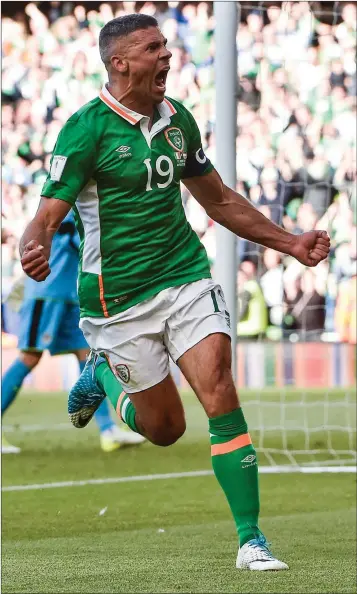  ??  ?? Jonathan Walters celebrates after scoring Ireland’s equaliser against Austria.