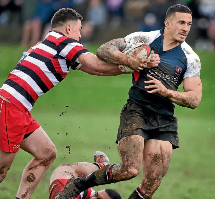  ??  ?? Sonny Bill Williams carries the ball for Counties B at Bombay Rugby Club yesterday. The big All Black put in a 70-minute shift to the delight of the locals.