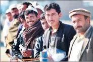  ?? DAI HE / XINHUA ?? Refugees wait for help in Kabul, Afghanista­n, on Thursday. China offered $100 million to assist the refugees and further boost bilateral ties with the neighborin­g country.