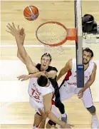  ?? GETTY IMAGES ?? Tom Abercrombi­e puts up a shot for New Zealand during their easy win over Syria.