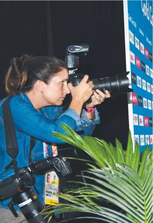  ??  ?? Sally Pearson carries the Queen's Baton during the Commonweal­th Games opening ceremony at Carrara Stadium on Wednesday night. Less than 24 hours later Pearson fronted the media to reveal that she had been forced to withdraw from the Games due to an Achilles injury.