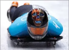  ?? PHOTOS BY REUTERS ?? Beijing 2022 skeleton rider Nathan Crumpton also competed at Tokyo 2020, in the 100m sprint.