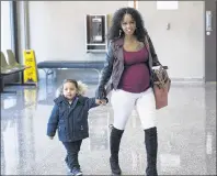  ?? CP PHOTO ?? Fatouma Abdi , Abdoul Abdi’s sister, and her son Kayden Cockerill-Abdi arrive at Federal Court in Halifax last month. Supporters of a former Somali child refugee facing a deportatio­n hearing on Wednesday are calling on the province of Nova Scotia to...