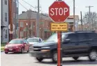  ?? ADAM CAIRNS/COLUMBUS DISPATCH ?? Traffic passes through the intersecti­on of North Champion and Mount Vernon avenues on the Near East Side.