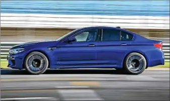  ??  ?? The M5 comes with all-wheel drive, which some aficionado­s felt was inappropri­ate for a track-capable BMW. Sorry boys, those days are over.