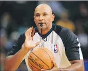  ?? Doug Pensinger Getty Images ?? KEVIN CUTLER, who has been an NBA referee for 10 years, manages officiatin­g for the Drew League.