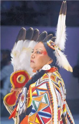  ?? JIM THOMPSON/JOURNAL ?? Joyce Hayes of Fort Hall, Idaho, dances in the Golden Age Women’s Traditiona­l competitio­n Friday during the Gathering of Nations inside Tingley Coliseum.
