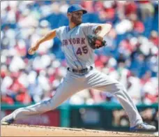  ?? MATT SLOCUM ?? New York Mets’ Zack Wheeler pitches during the first inning of a baseball game against the Philadelph­ia Phillies, Thursday, June 27, 2019, in Philadelph­ia.