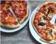  ?? KARON LIU FOR THE TORONTO STAR ?? Karon Liu’s homemade versions of Pizzeria Libretto pies. The homemade version is slightly chewier than Libretto’s pizzas.