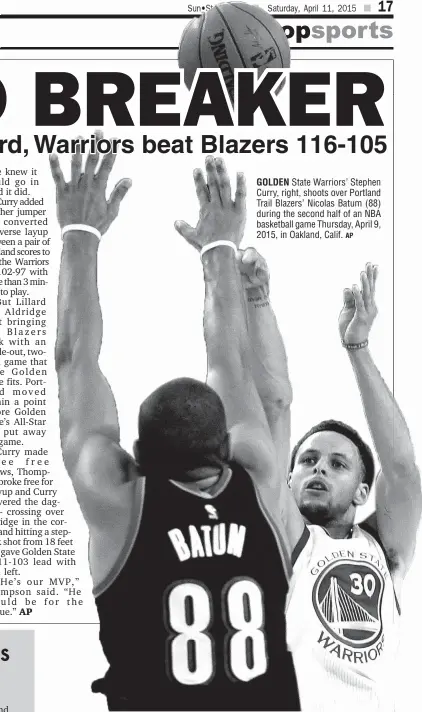  ?? AP ?? GOLDEN State Warriors’ Stephen Curry, right, shoots over Portland Trail Blazers’ Nicolas Batum (88) during the second half of an NBA basketball game Thursday, April 9, 2015, in Oakland, Calif.