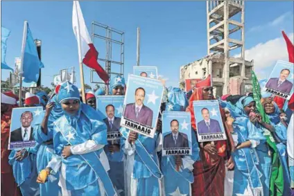  ?? Photo: Feisal Omar/Reuters ?? Farmajo: Somali women celebrate the election of Mohamed Abdullahi Mohamed as president — but the expectatio­ns of him to deal with the troubles that bedevil the country are unrealisti­c.