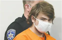  ?? BRENDAN MCDERMID / REUTERS ?? Payton S. Gendron appears in court on Thursday, where he was indicted by a grand jury in the live-streamed supermarke­t shooting in a Black neighbourh­ood of
Buffalo last Saturday that saw 10 people killed.
