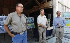  ?? THE (TOLEDO) BLADE ?? Ohio Agricultur­e Director David Daniels (left) believes he was fired over reservatio­ns about an executive order issued by Gov. John Kasich on July 11.