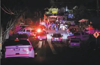  ?? Philip Pacheco / AFP / Getty Images ?? Emergency teams quickly responded to Gilroy Garlic Festival shootings. Many medical personnel who were on duty there or attending the event quickly aided the wounded.