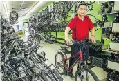  ?? RIC ERNST/PNG FILES ?? Louis Kwan of Bayshore Bicycles says the city is competing with bike rental shops for tourist dollars.