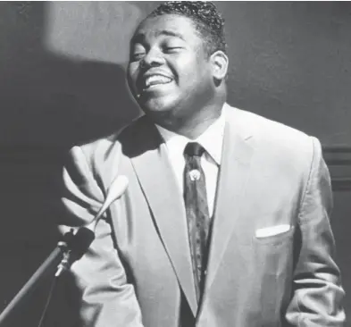  ??  ?? A 1958 photo of Fats Domino in the movie The Big Beat. The legendary blues/rock musician passed away last week.