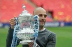  ?? KIRSTY WIGGLESWOR­TH ?? Pep Guardiola.