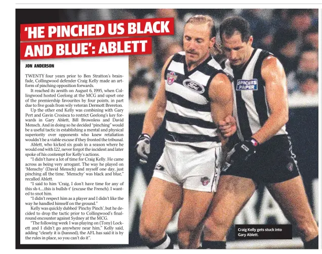  ??  ?? Craig Kelly gets stuck into Gary Ablett.