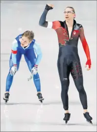  ?? AP PHOTO/JOHN LOCHER ?? Silver medallist Ted-Jan Bloemen of Canada celebrates after finish a fraction of a second before bronze medallist Norway’s Sverre Lunde Pedersen, left, in the men’s 5,000 meters race at the Gangneung Oval at the 2018 Winter Olympics in Gangneung, South...