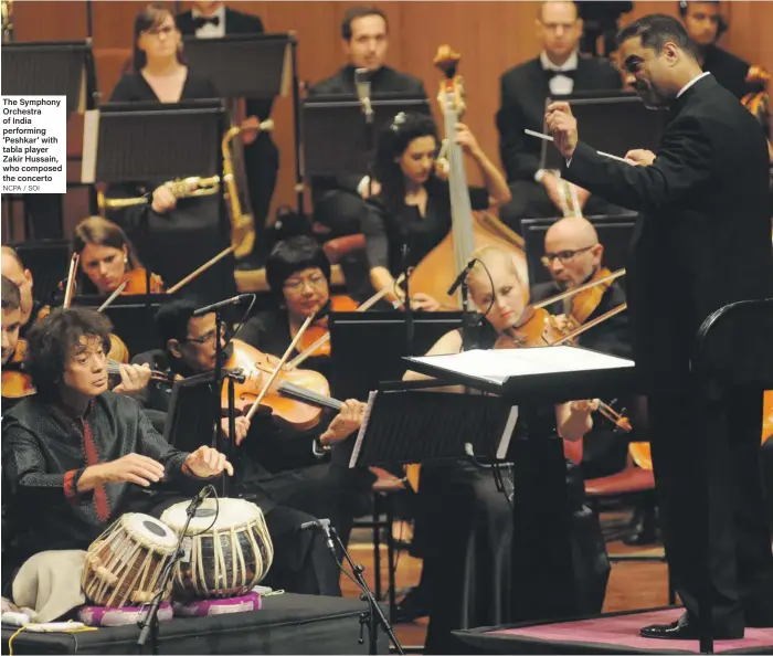  ?? NCPA / SOI ?? The Symphony Orchestra of India performing ‘Peshkar’ with tabla player Zakir Hussain, who composed the concerto