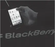  ?? NATHAN DENETTE/THE CANADIAN PRESS ?? Sales from BlackBerry’s service access fee have been sliding since 2013, as the Waterloo, Ont.-based tech company lost some customers and others upgraded to new models.