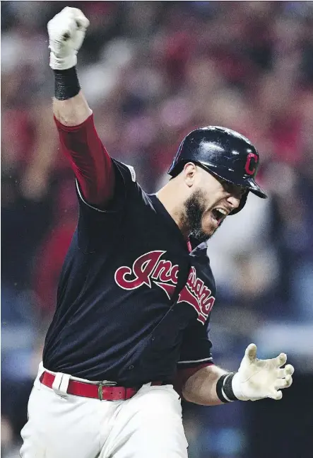  ?? DAVID DERMER/THE ASSOCIATED PRESS ?? Cleveland catcher Yan Gomes reacts after hitting a game-winning RBI single off Yankees pitcher Dellin Betances in the 13th inning of Game 2 Friday to give the Indians a 2-0 ALDS lead.