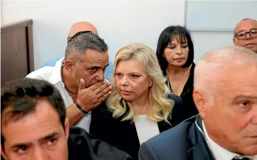  ?? AP ?? Wife of the Israeli Prime Minister Benjamin Netanyahu, Sara, centre, sits in a courtroom in Jerusalem during an appearance of charges of fraud and breach of trust.