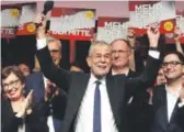  ??  ?? Austrian independen­t candidate Alexander Van der Bellen celebrates during an election party Sunday in Vienna after presidenti­al elections.