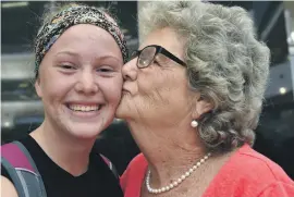  ?? Pictures: Tracy Lee Stark ?? GRATEFUL GRANNY. Savana-Lee Stevens with her grandmothe­r, Sue Stevens, after the girls returned yesterday.