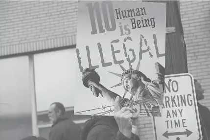  ?? AFP PHOTO ?? People protest outside of the Elizabeth Detention Center during a rally attended by immigrant residents and activists in Elizabeth, New Jersey.