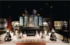  ?? CHRIS CARLSON — THE ASSOCIATED PRESS ?? The Reception Throne Set is shown in the exhibition “Express Dowager, Cixi.” at Orange County’s Bowers Museum, Thursday in Santa Ana, Calif.