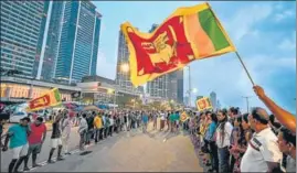  ?? AFP ?? Anti-government demonstrat­ors near the president’s office in Colombo.