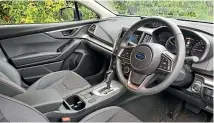  ??  ?? The XV’s interior is pleasantly roomy, with some nice contrastin­g stitching to lift the mood.