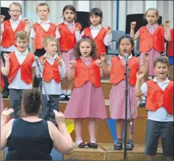  ??  ?? Downsview school pupils sing South African Songs