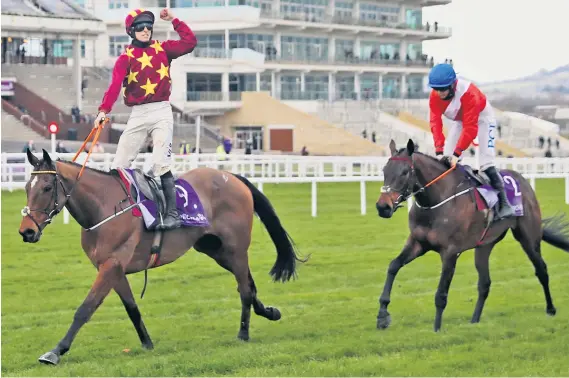  ??  ?? Cheltenham champions: Jockey Jack Kennedy celebrates winning the Wellchild Cheltenham Gold Cup on Minella Indo ahead of A Plus Tard and Rachael Blackmore