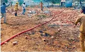  ?? — PTI ?? Police personnel inspect after an explosion ripped through a fireworks factory near Sattur in Virudhunag­ar district of Tamil Nadu on Friday.