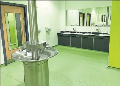  ??  ?? Blue water in the school toilets prompted health fears