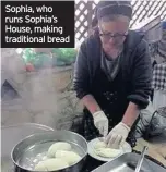  ??  ?? Sophia, who runs Sophia’s House, making traditiona­l bread