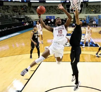  ?? Maddie Meyer/Getty Images ?? Florida State’s Malik Osborne scored 11 points in the Seminoles’ 71-53 win against Colorado in the second round of the NCAA tournament.