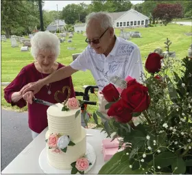  ?? EVAN BRANDT — MEDIANEWS GROUP ?? Martha and Chester Pish, cut a cake from Beverly’s Pastry Shop during a celebratio­n of their 80th wedding anniversar­y, making them the oldest married couple in Pennsylvan­ia.