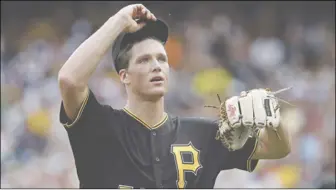  ?? Gene J. Puskar/ The Associated Press ?? Hart High School alumnus and profession­al baseball player Tyler Glasnow was traded from the Tampa Bay Rays to the Los Angeles Dodgers on Thursday.