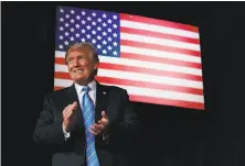  ?? Evan Vucci / Associated Press ?? President Trump speaks to active-duty service members during a military tribute in White Sulphur Springs, W.Va.